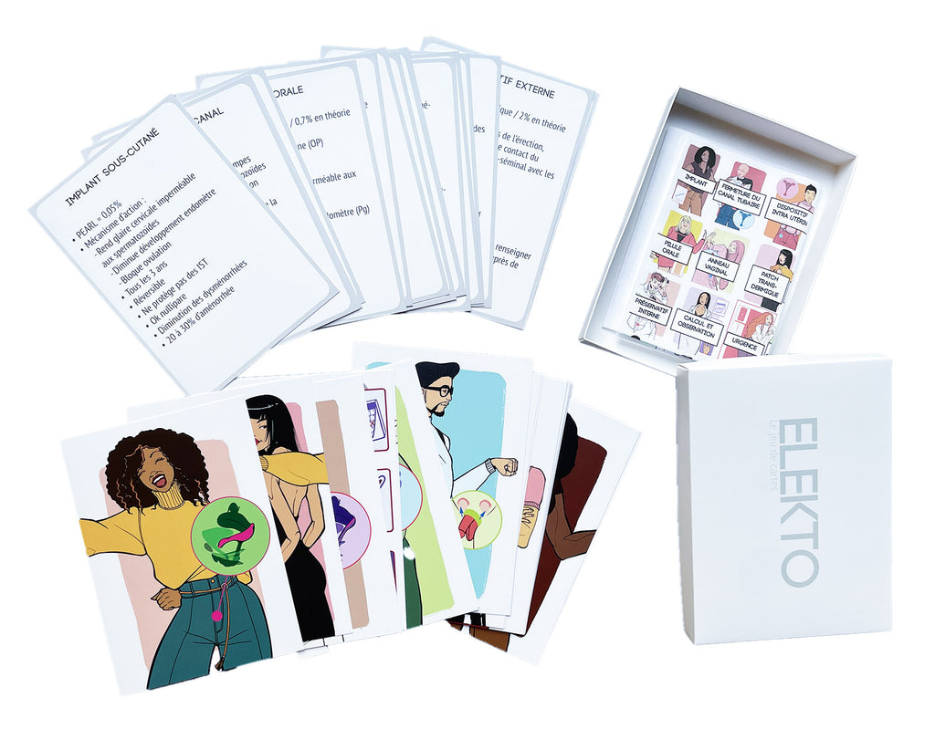 Jeu de cartes ELEKTO grand format étalé, avec les cartes visibles et la boîte de rangement ouverte à côté